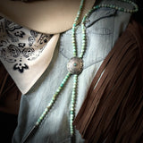Turquoise beaded necklace bolo with silver concho