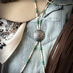 Necklace bolo with turquoise concho on bone, turquoise and antique silver beads