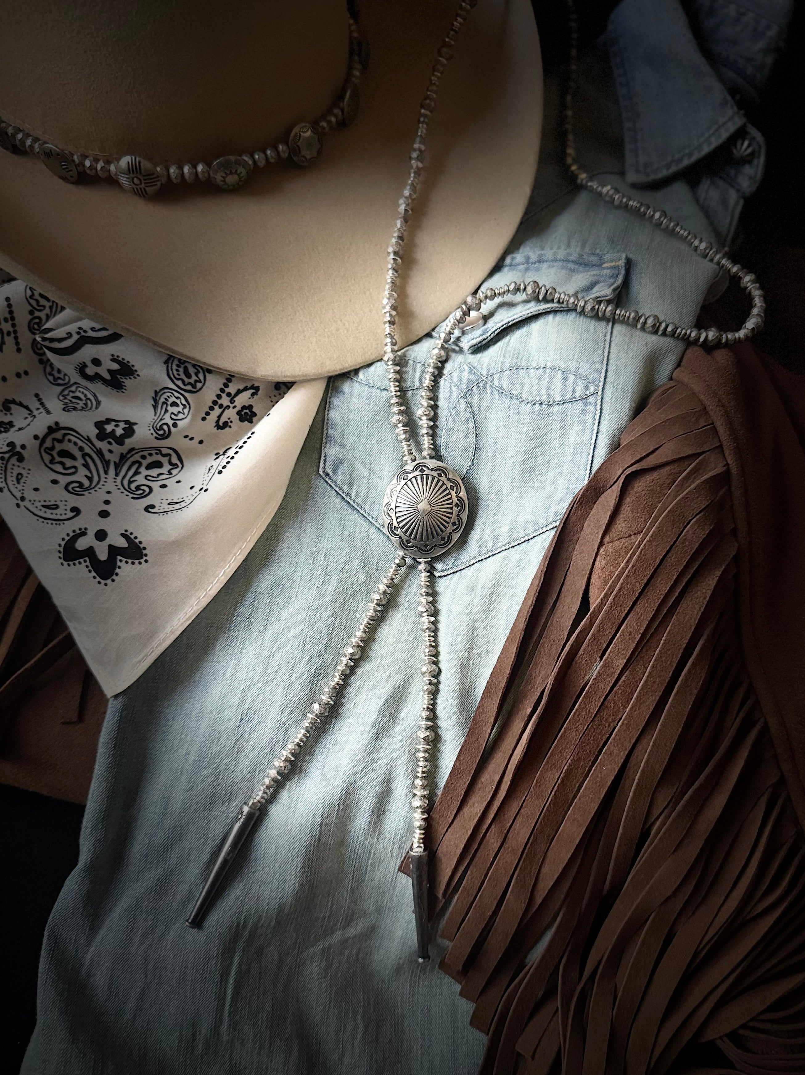 Antiqued silver beaded necklace bolo with silver concho